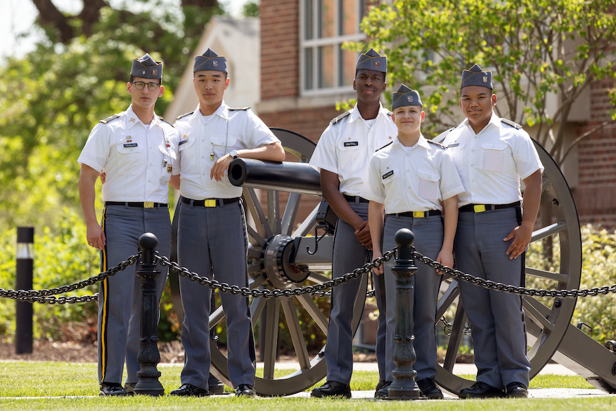 Boys around a cannon.